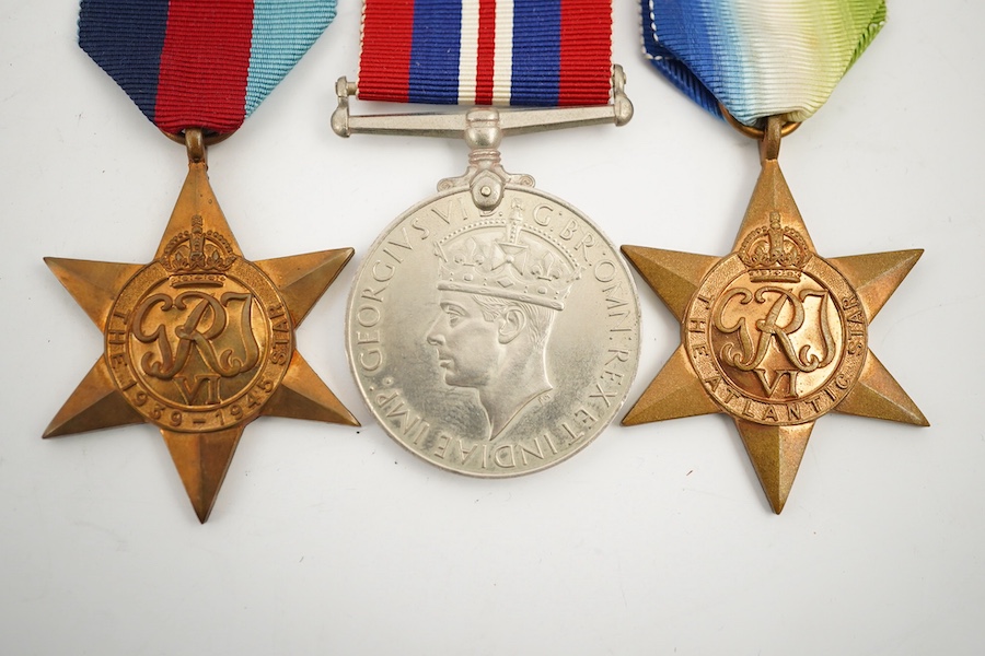 A First World War George V Bravery in the field medal awarded to CPL. R.E. Cox 11th Royal Sussex, a Second World War trio and miniatures, a Masonic medal, etc. (11). Condition - fair to good.